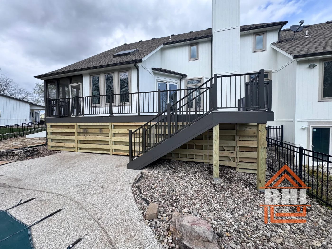 Wood deck and staircase rebuild at a two-story home built by Boyt Home Improvement